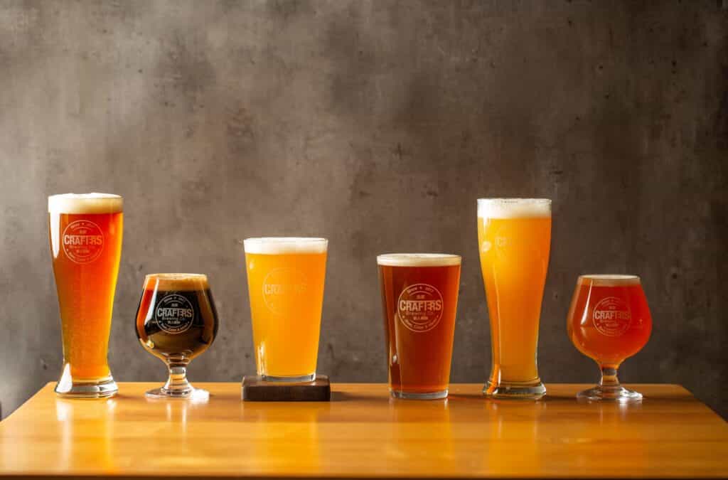 5 different craft beers on a polished table